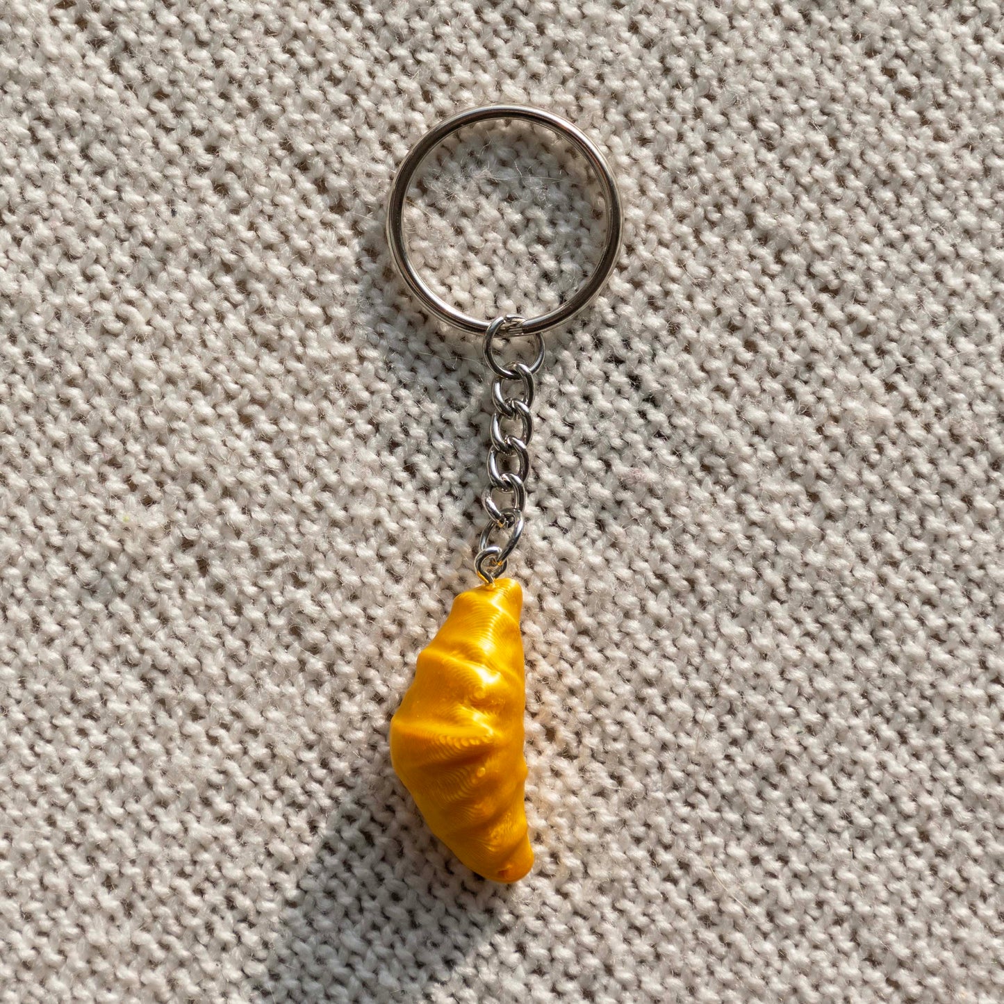 Croissant Charm - speelse decoratie die overal past